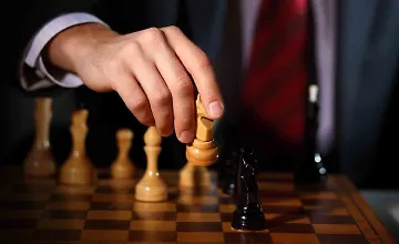 Изображение курса Игры, которые играют люди: Теория игр в жизни