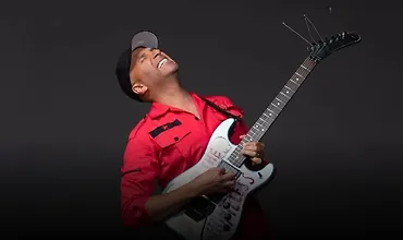 Изображение курса Том Морелло обучает игре на электрогитаре.