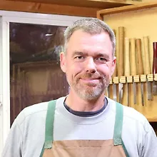 Энди Чапман logo